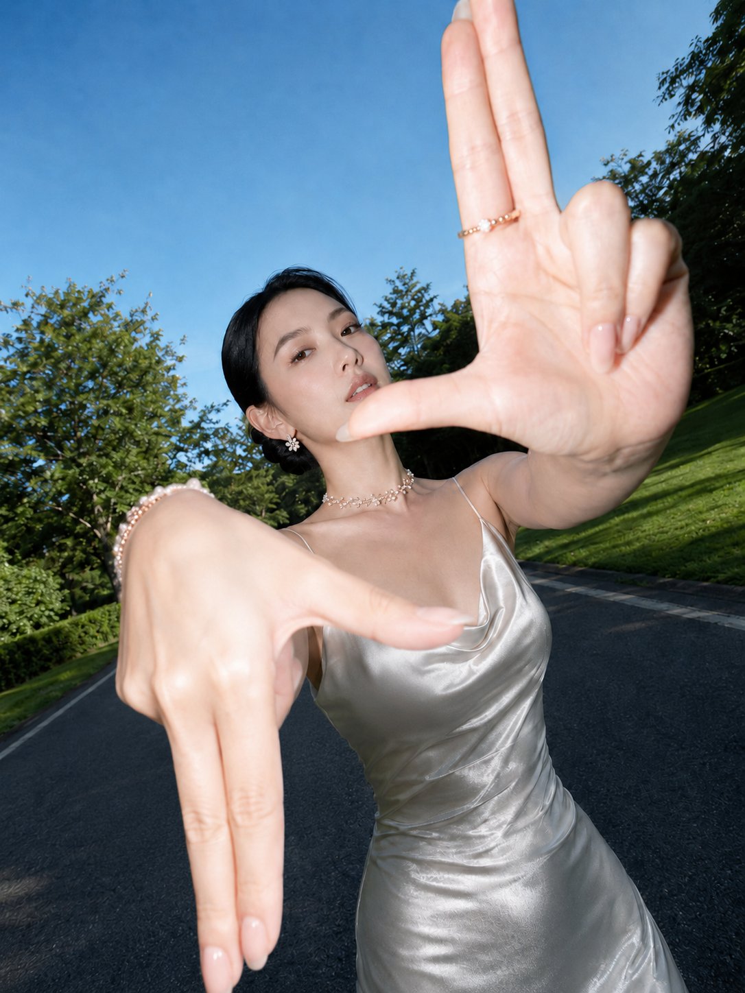 Woman making frame gesture with hands