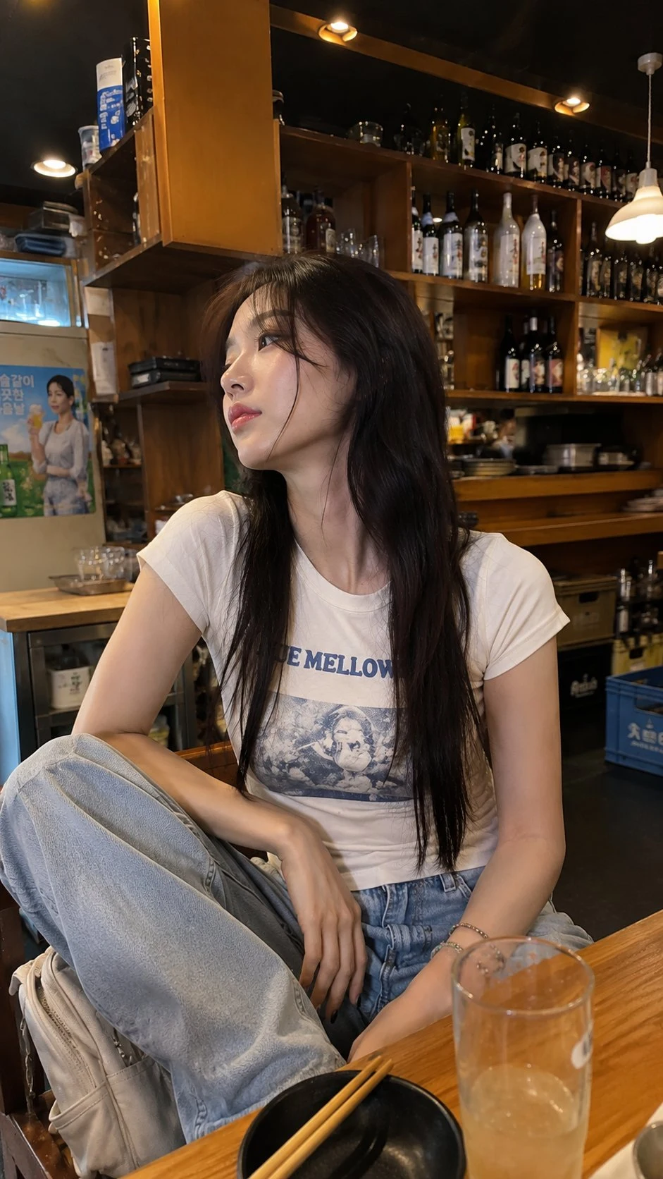 Young East Asian woman candid portrait in cozy cafe,