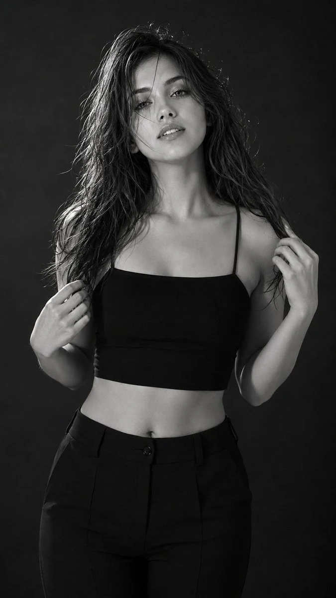 Cinematic monochrome fashion portrait of confident