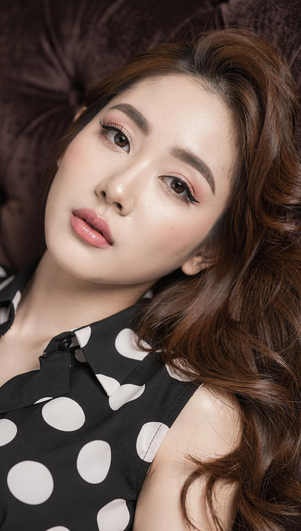 Close-up portrait of a young East Asian woman in a