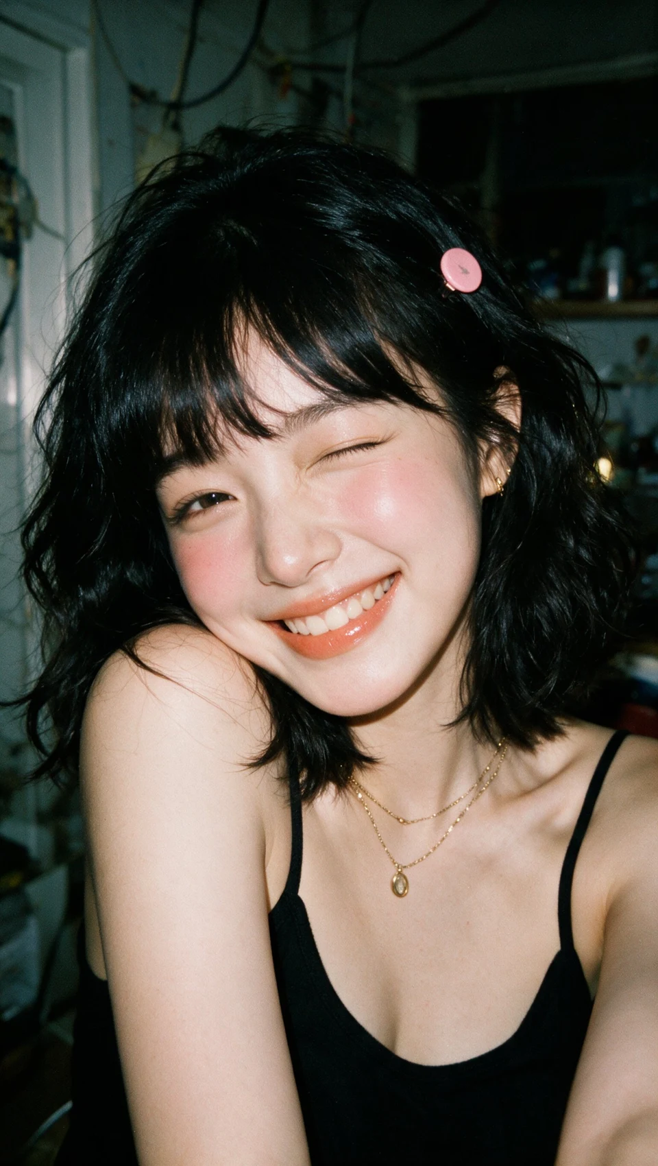 Young east asian woman winking with playful smile in