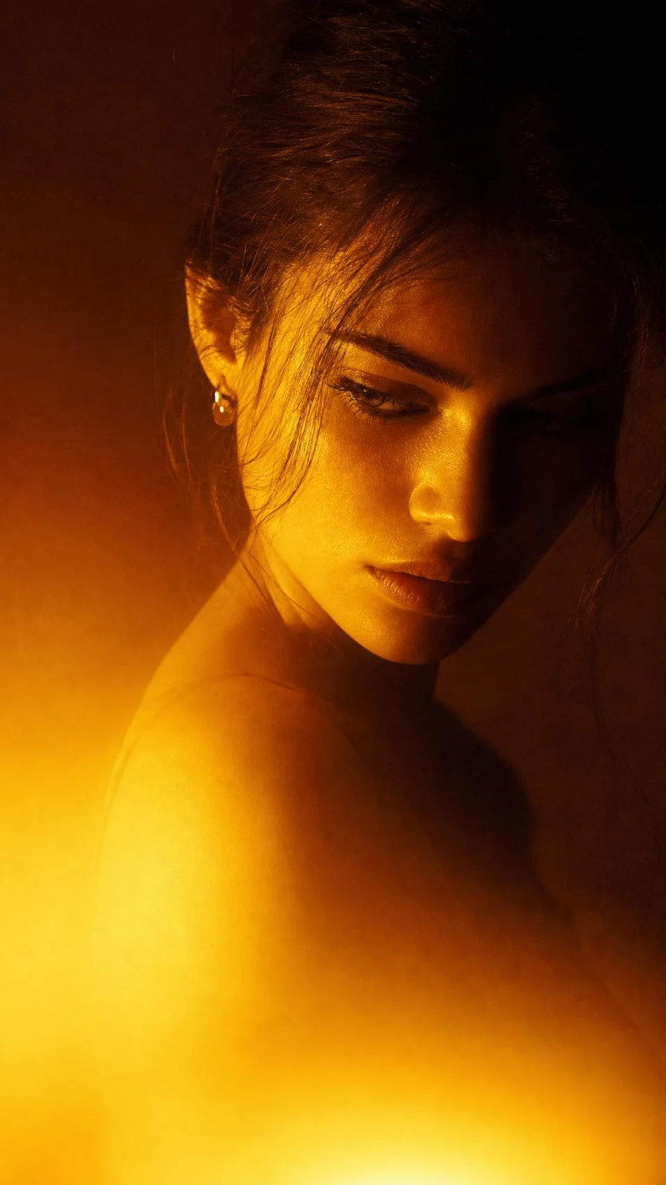 Dramatic cinematic portrait of a woman with golden