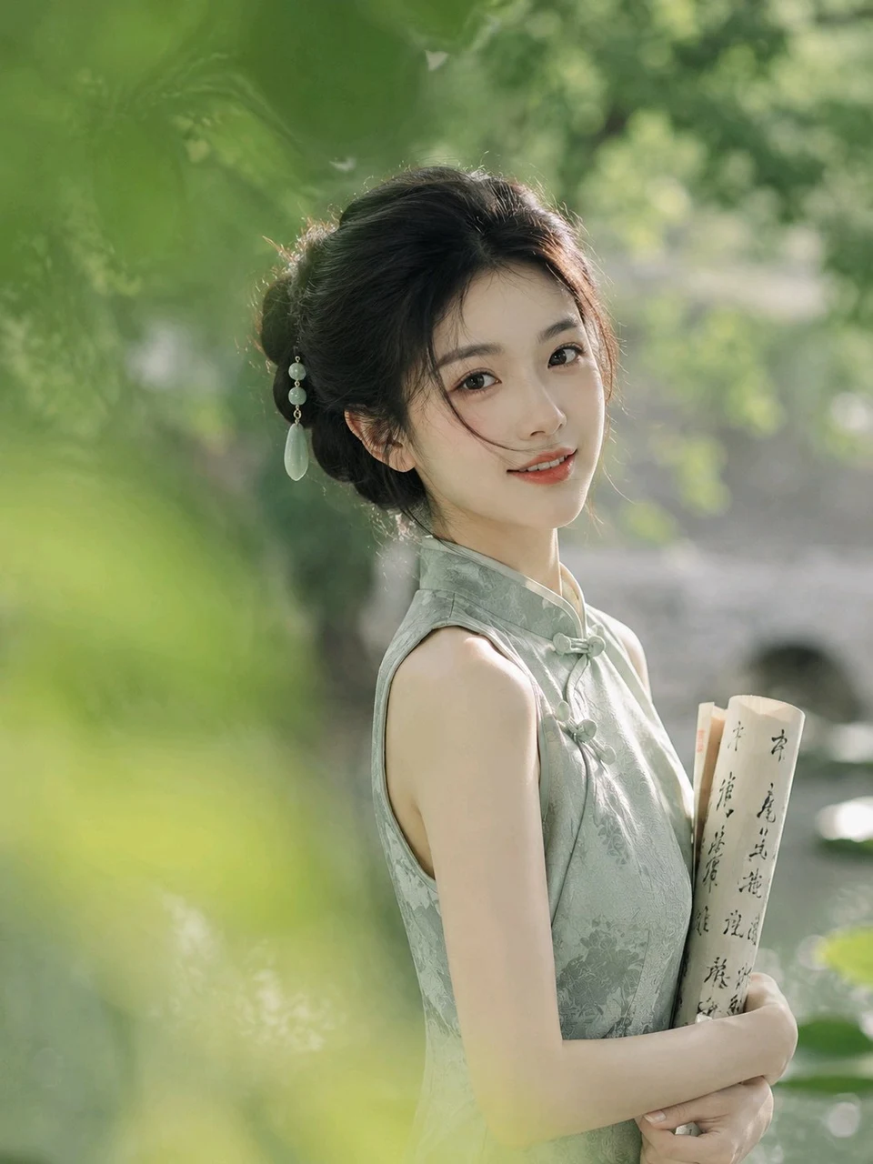 Beautiful Oriental woman in traditional pale green