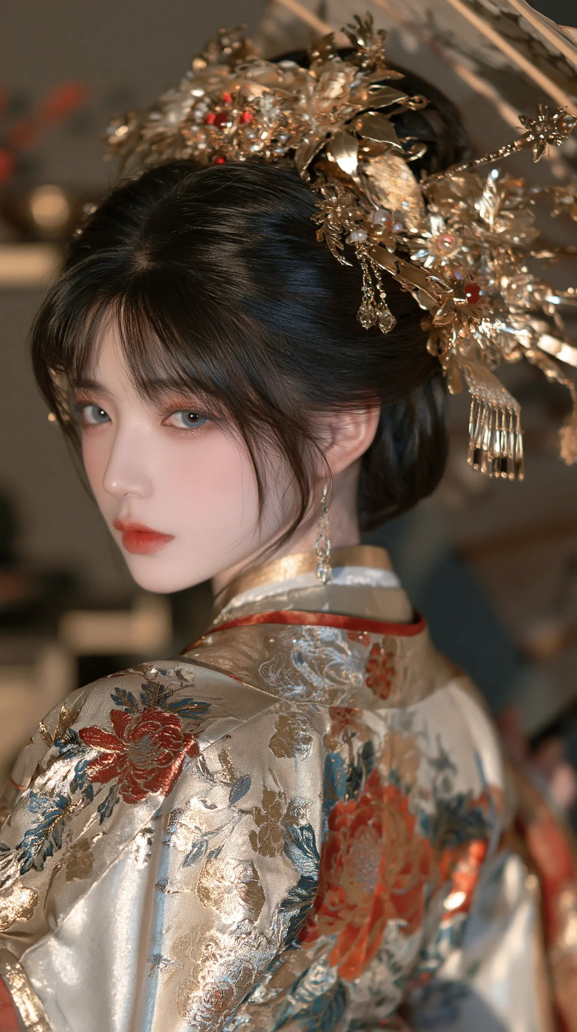 elegant east asian woman in golden chinese wedding