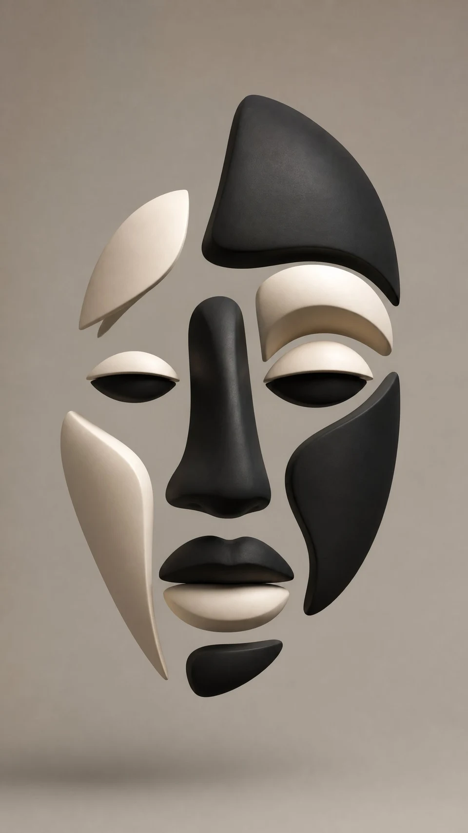 Minimalist geometric face sculpture in black and