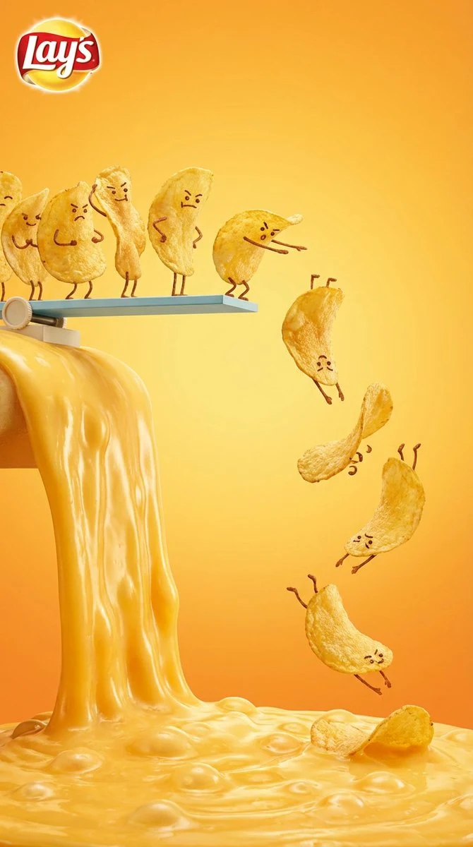 Lays potato chips diving into melted cheese